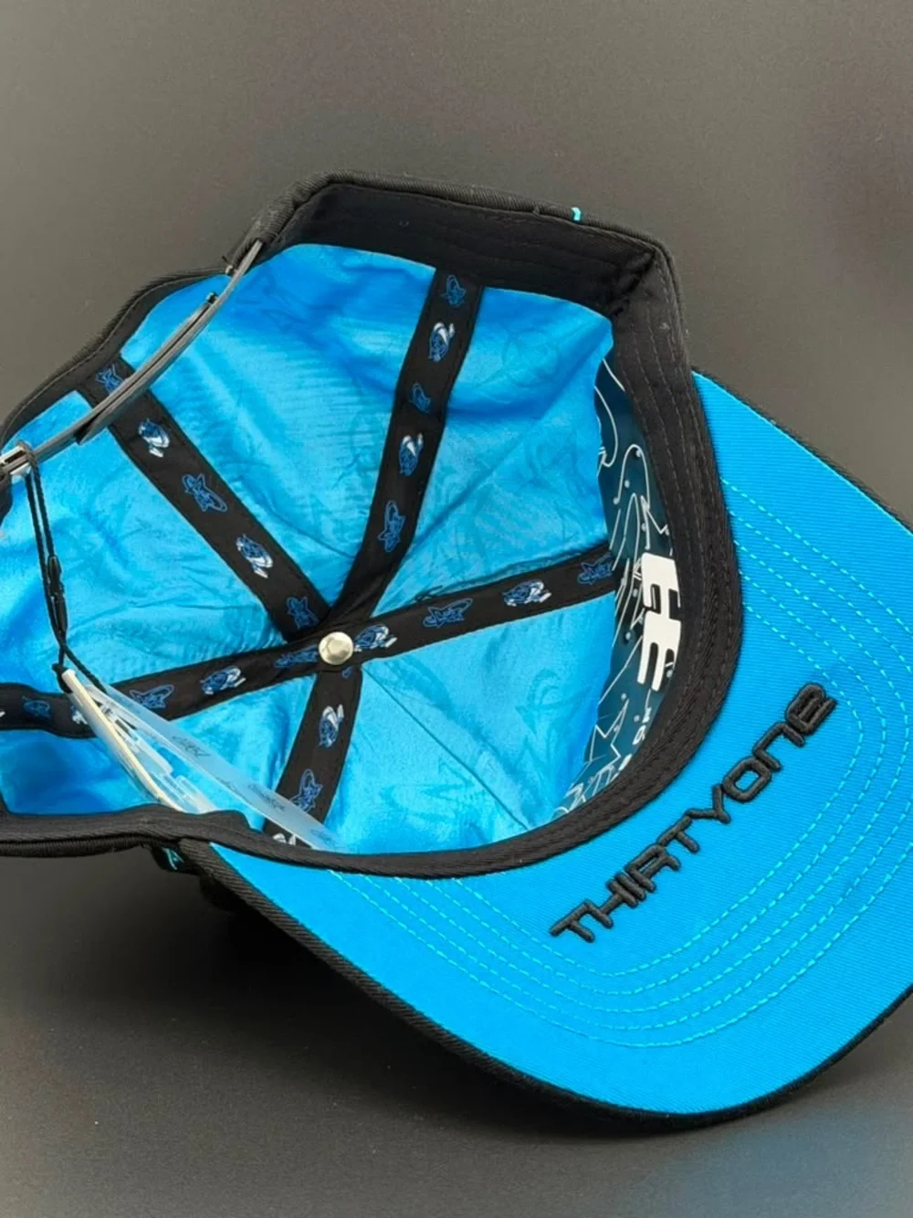 Black Baseball Cap with Blue & White Star Accent
